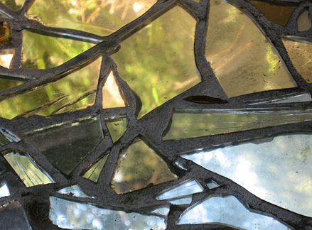 Reflective Stone (detail), mirror, grout, on stone, 28”x15”x22”