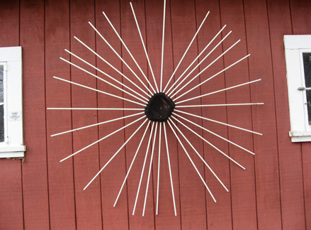 Eclipse, fiberglass wands and burned wood, 6’ diameter x8'