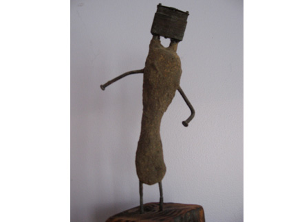 Little Figure, clay, sand, metal, and wood, 15”x5”x4”